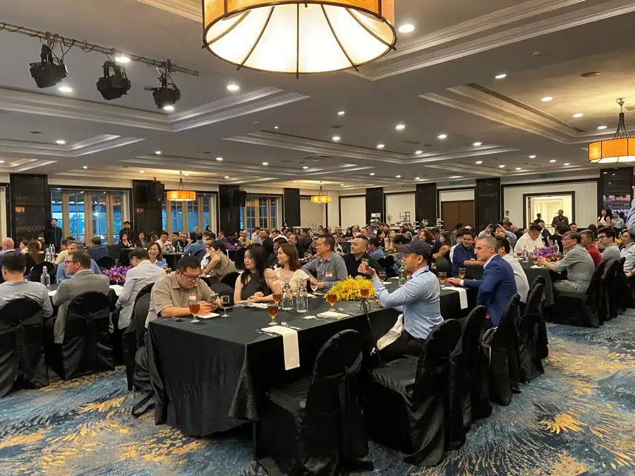 Attendees at the FCSI APD Conference 2023 seated at round tables in a banquet hall, engaging in networking and presentations.