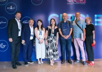 Group of professionals posing in front of a CIRCLE 2025 event backdrop at FCSI Asia Pacific conference.